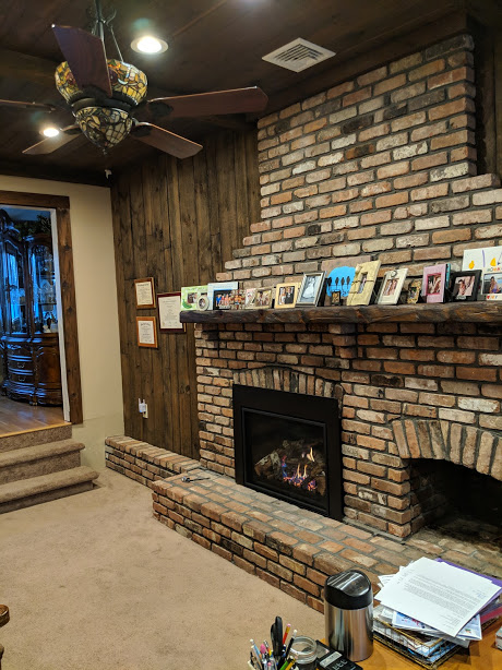 Fireplace and living space before transformation